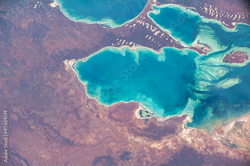 Satellite view of the coast of Australia. Digital Enhancement. Elements of this image furnished by NASA