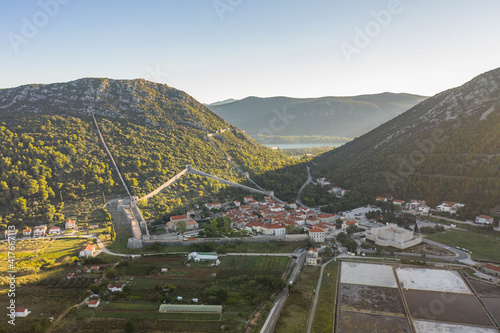 Aerial drone shot of Ston with Salt Pan in Ragusa near Dubrovnik in Croatia Summer morning sunrise
