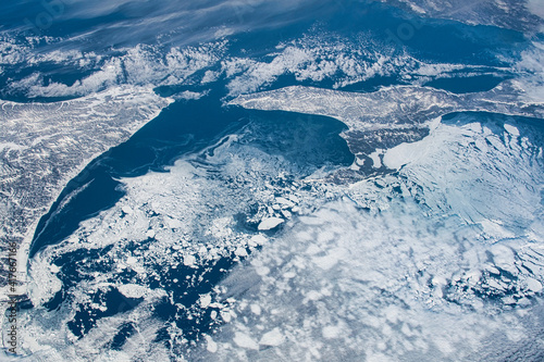 Fototapeta Naklejka Na Ścianę i Meble -  Clouds and coast of Japan. Digital Enhancement. Elements of this image furnished by NASA