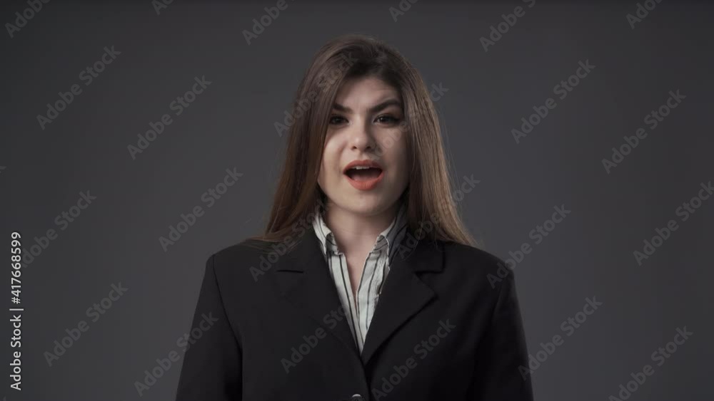 Angry young businesswoman yelling Angry young businesswoman yelling