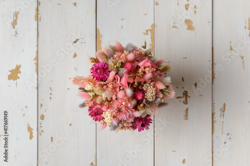 Fototapeta Naklejka Na Ścianę i Meble -  Beautiful, spring bouquet of dried flowers, top view, close-up