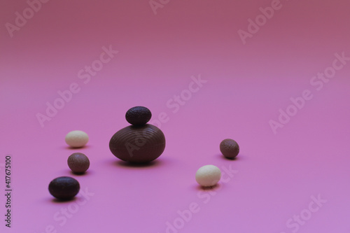 Canvas Print Construction from white, milk and dark chocolate eggs for Easter.