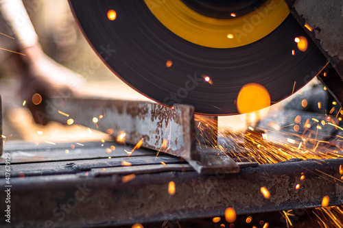 Wallpaper Mural closeup of circular grinder cutting iron Torontodigital.ca