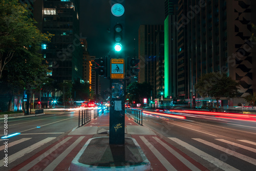 Sao Paulo, Brazil - February 6, 2021 -Movement of car lights at night on Avenida Paulista. photo