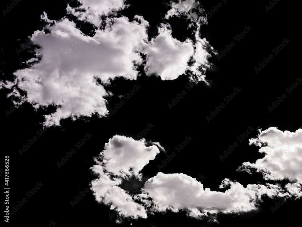 cloudy sky with some clouds in stormy weather isolated on black background
