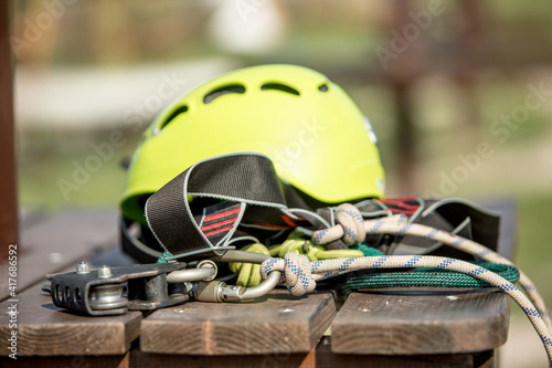 close up of a helmet and other equipment in rope park photo