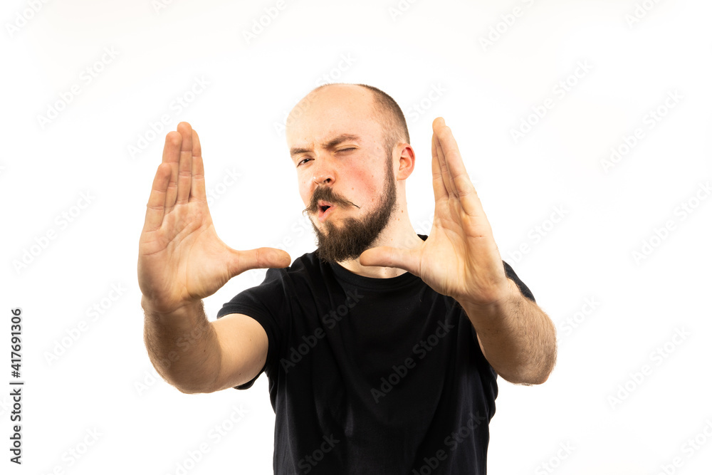 In each photo in the series, the man shows different emotions. In each photo in the series, the man shows different emotions.
