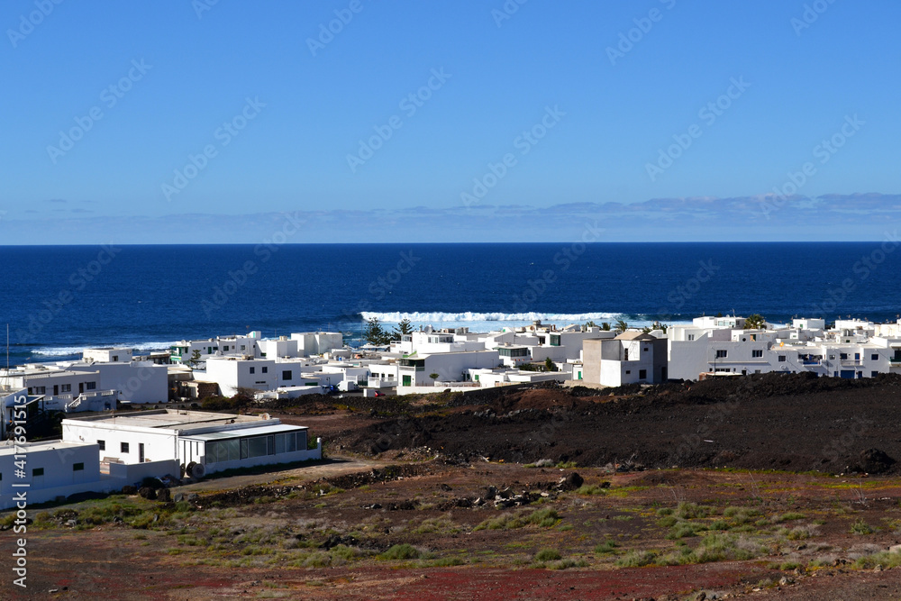 white village, ocean coastline