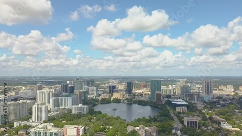 525 Drone of downtown Orlando with lake Eola and clouds