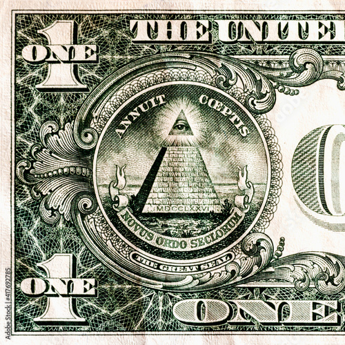 One dollar bill detail. The all-seeing eye. American finance and currency concept.