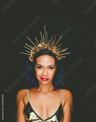 portrait of a woman with gold crown