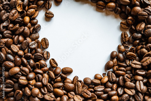 Light Spot Surrounded by Roasted Coffee Beans,. Ingredient for Preparing a Drink.