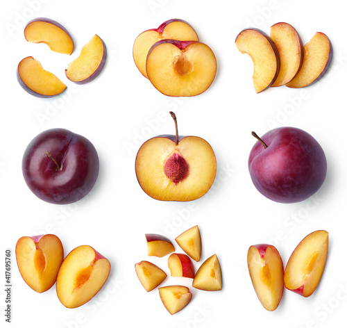 Obraz na plátne Set of fresh ripe whole, half and sliced plum