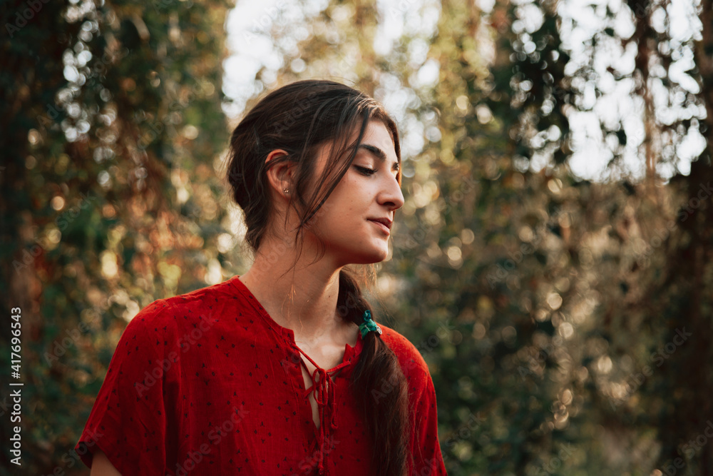 Beautiful woman looking down. Fall season. Amazing autumn mood. Beautiful woman looking down. Fall season. Amazing autumn mood.