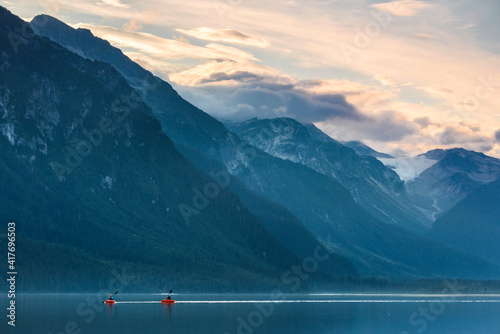 USA, Alaska, Haines Borough. Chilkoot Lake, Kayakers on Chilkoot Lake. photo
