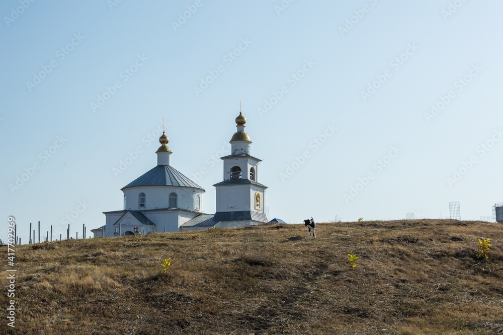 Beautiful landscape in pale colors, view of the temple on the hill Beautiful landscape in pale colors, view of the temple on the hill