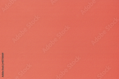 Red paper texture. Abstract background and texture for design. High-quality grain texture in a high resolution. Colour paper background.