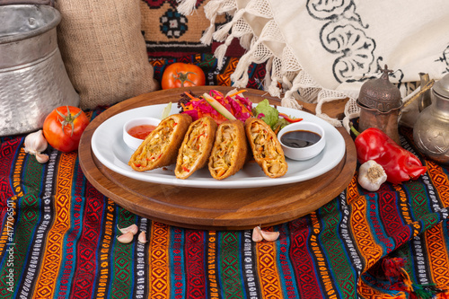 Ready-to-serve meals cooked on a white plate photo