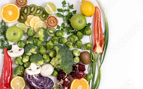 Grocery composition with bright fresh vegetables on an isolated background Top view on healthy fruits