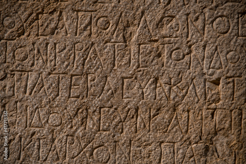 beautiful inscriptions containing curious holes from ruins of Patara