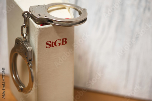 Slika na platnu handcuffs on german penal code called stgb (focus on letters)