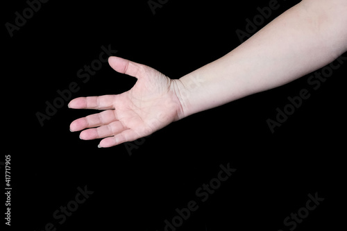 female hand on black background, old skin with wrinkles and veins, concept of health, age-related changes, love, tender relationship, isolated image