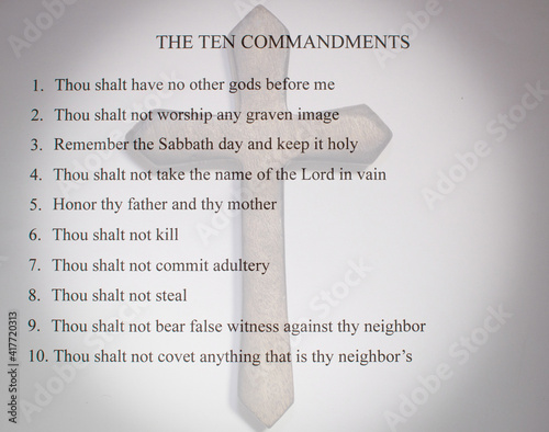 Fotografía the ten commandments with a rustic wooden cross overlaid