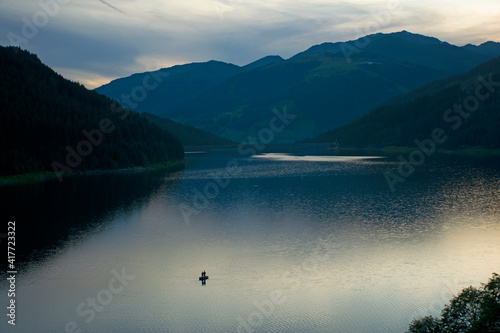 Fishing in Austria In the mountains on a calm lake
