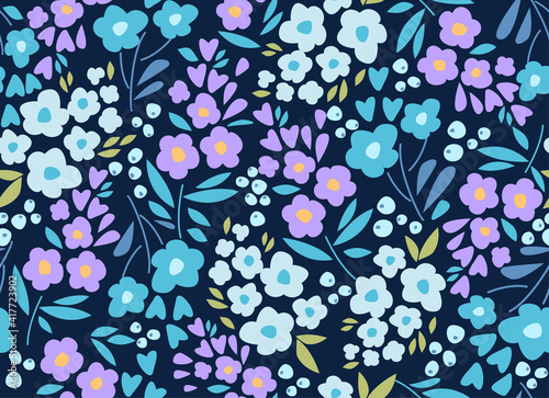 Seamless pattern with purple and blue flowers