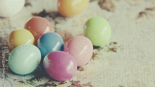 Easter eggs on vintage fabric. multi colored easter eggs on a traditional background