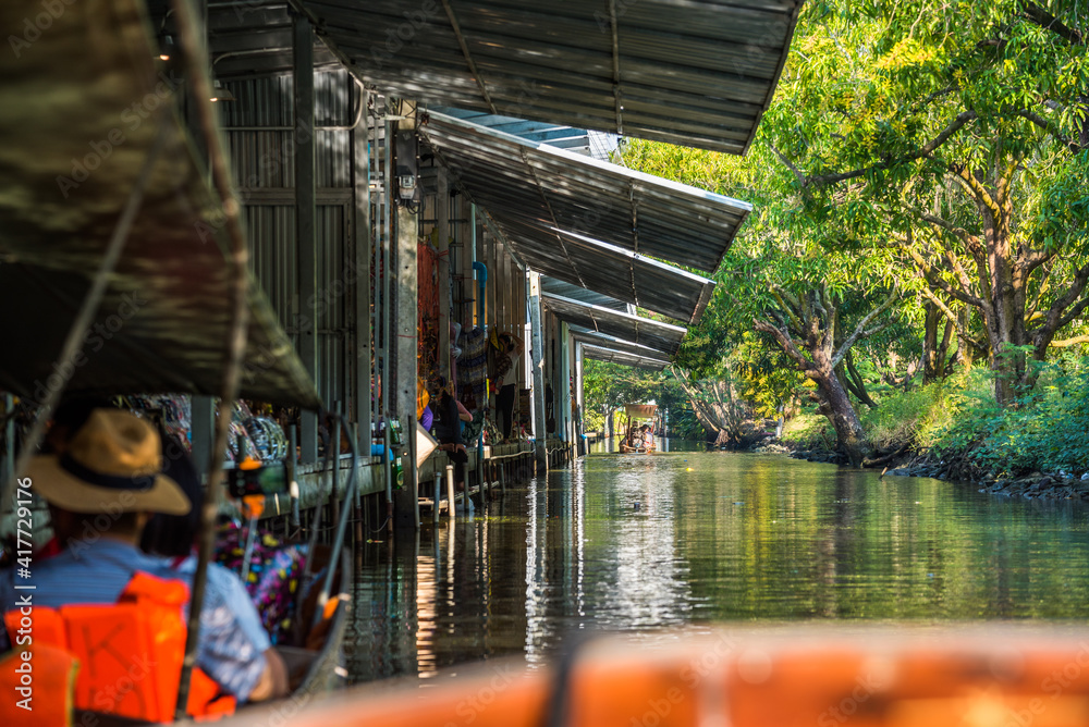 Famous Floating Market in Thailand, Damnoen Saduak Floating Market, Tourists Visiting by Boat, Ratchaburi, Thailand.