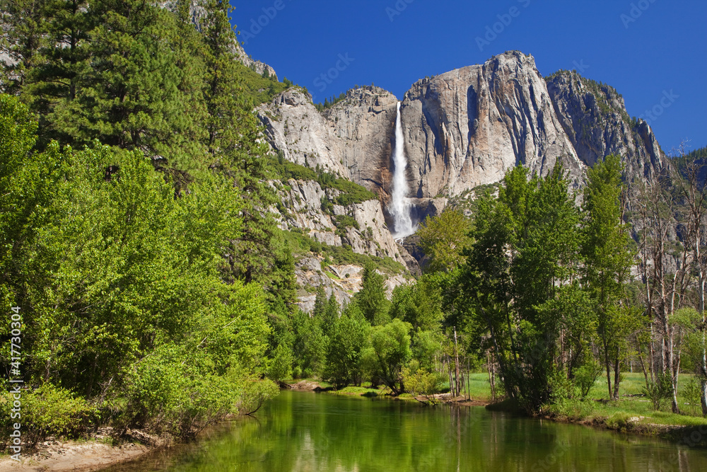 USA, California, Yosemite National Park. Yosemite Falls and Merced River landscape.
