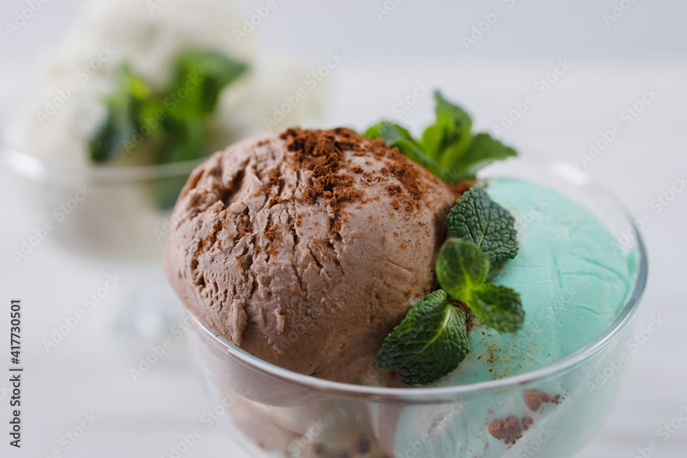 Ice-cream. Flavored sundae variety in glass bowls, refreshing dessert for summertime. Ice-cream. Flavored sundae variety in glass bowls, refreshing dessert for summertime.
