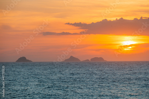 sunset at ipanema beach in rio de janeiro.