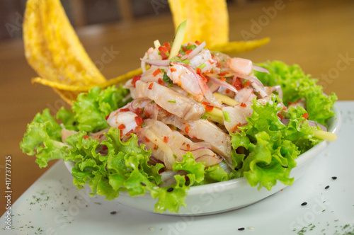 glass of salmon with vegetables and banana