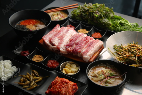 Thick Korean-style raw pork belly dish 두툼한 한국식 생삼겹살 요리