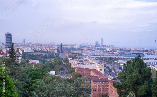 View of Barcelona from the observation deck on a warm summer evening.