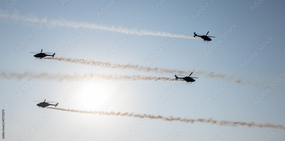 Indian Air Force Sarang helicopter air display team flying HAL Dhruv aircraft. Indian Air Force Sarang helicopter air display team flying HAL Dhruv aircraft.