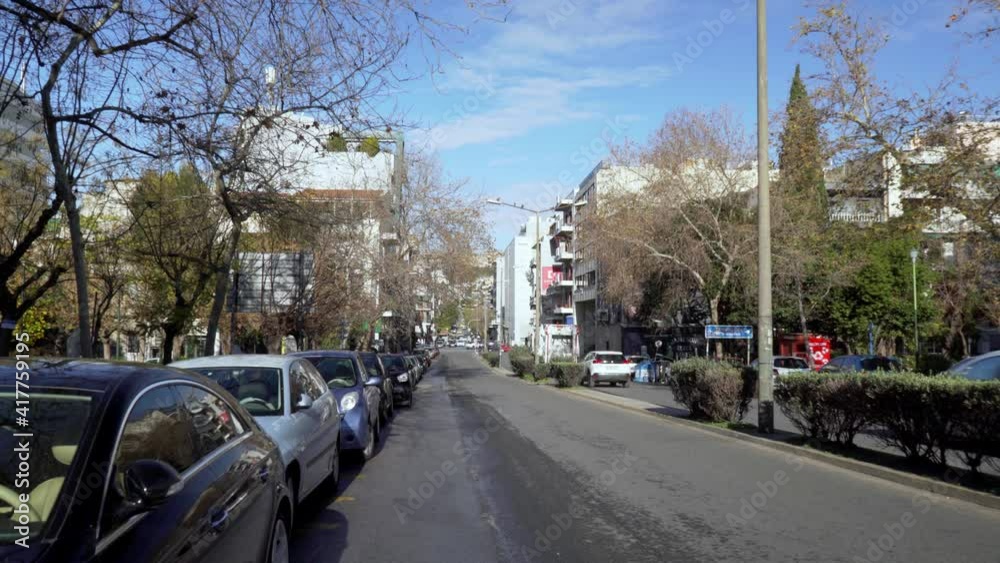 Tilt down establishing shot of Frantzi street, one of the busiest streets of Athens, deserted during coronavirus lockdown traffic restrictions Tilt down establishing shot of Frantzi street, one of the busiest streets of Athens, deserted during coronavirus lockdown traffic restrictions
