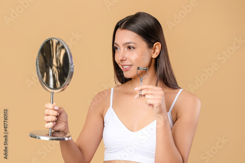 Beautiful young woman with ...