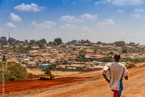 Running next to Kibera slum