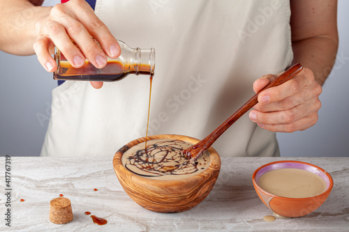 Foto Tahin Pekmez is a traditional Turkish food made with mixing grape molasses with tahini
