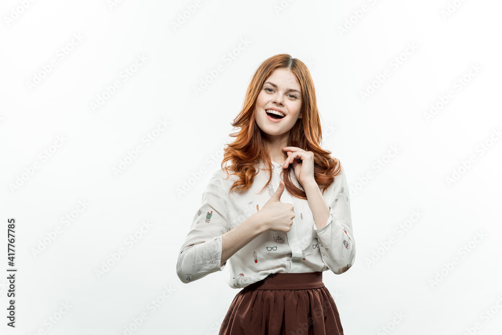 smiling woman with red hair in suit light background model smiling woman with red hair in suit light background model