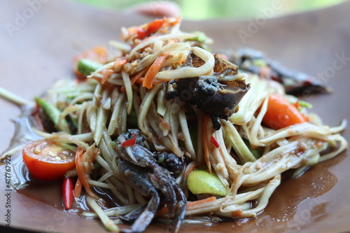 papaya salad with fermented fish sauce and crab it native thai food style spicy.