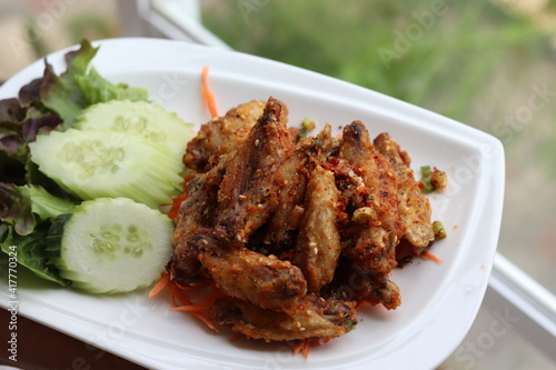 Spicy chicken wings, Thai style food.