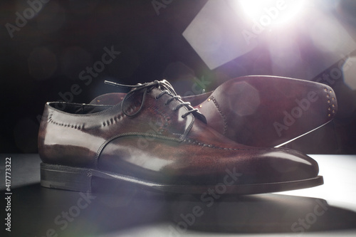 Man's shoes on black background photo