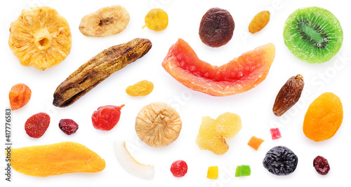 Dried fruits and berries isolated on white background. Lemon, orange,  raisin, cranberry, kiwi, cherry, ginger, plum,  strawberry, banana, candied fruits,  tangerine, date, pineapple, fig.