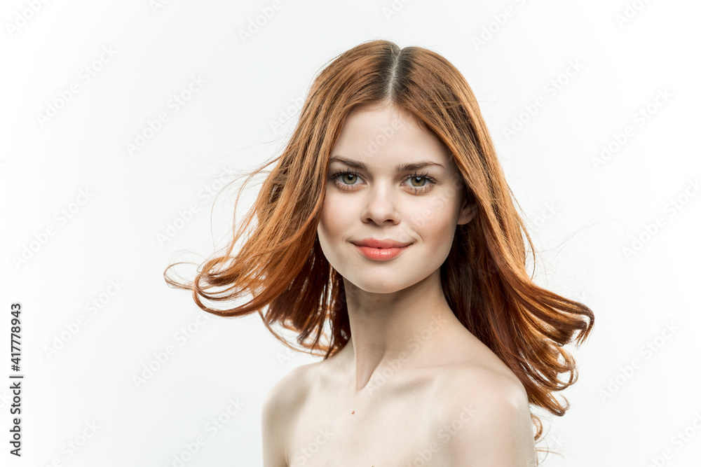 Fototapeta premium woman with bare shoulders attractive look loose hair smile