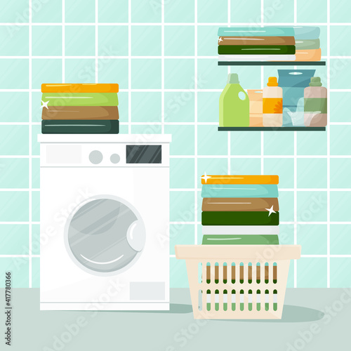 Home laundry concept. There is a washing machine with laundry baskets, detergent and towels. Clean washed linen, cleanliness in the laundry. Washing and cleaning concept.