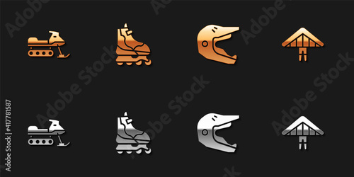 Set Snowmobile, Roller skate, Motocross motorcycle helmet and Hang glider icon. Vector.